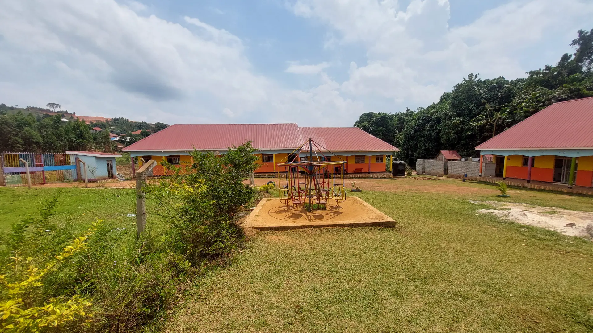 Playground and classroom blocks at Wisdom Valley Nursery and Primary School
