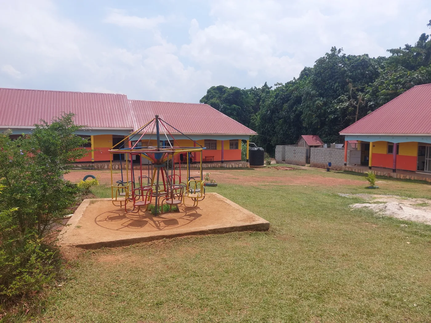 Playground and classroom blocks at Wisdom Valley Nursery and Primary School